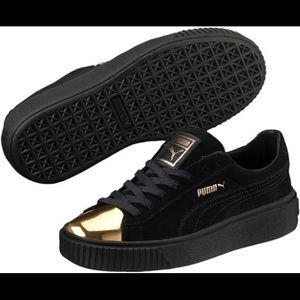 Black and Gold Puma Sneakers